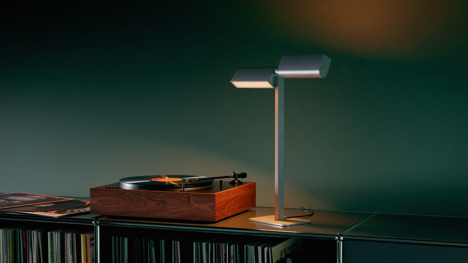 Lambert & Fils Ipoli table lamp set on a USM Haller shelf with vinyl records and a vintage turntable